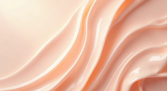 Smooth glossy pink silk fabric with flowing folds, representing a luxurious feel for Signature Scent Set – Rose