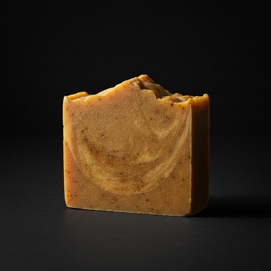 Natural handmade soap bar with warm brown tones and textured swirls from the Glow Starter Kit